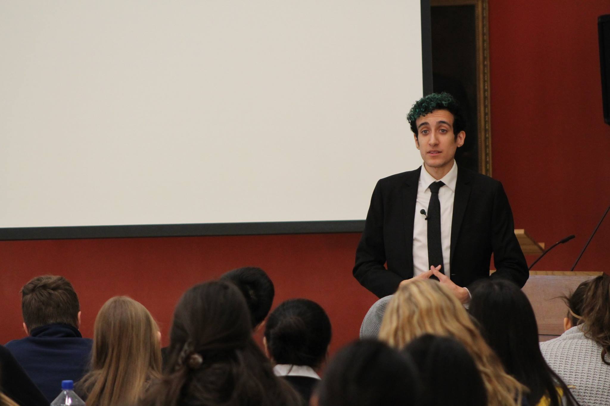 Blaise Alleyne speaking to an auditorium